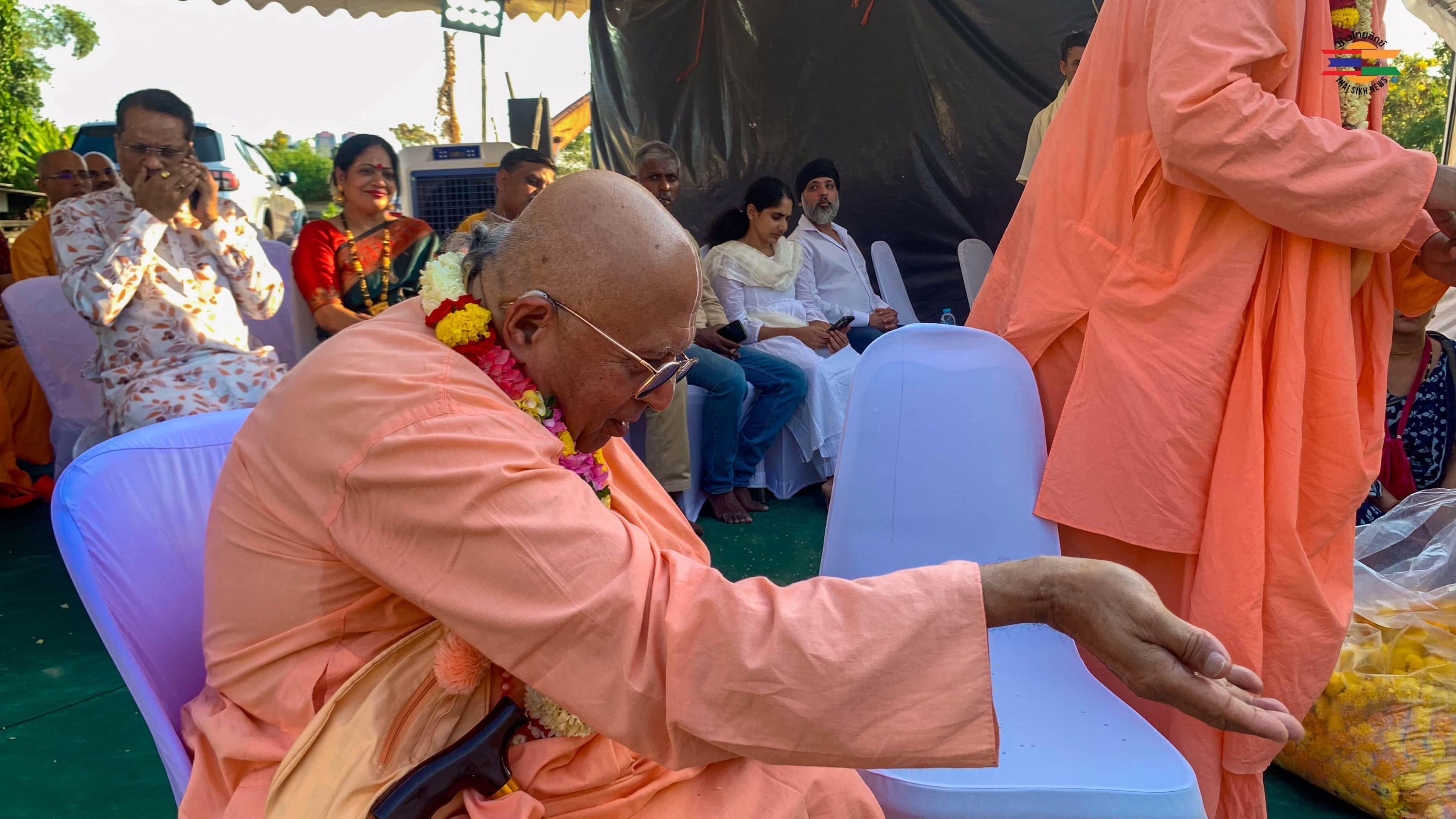 Spiritual leader addressing devotees